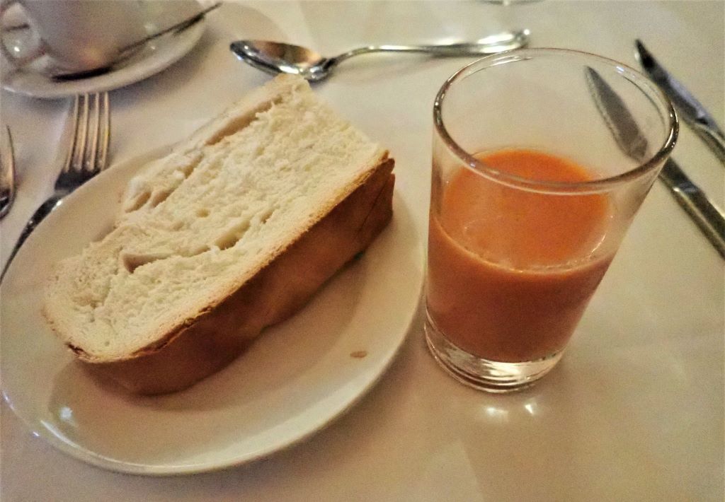 Bread and a glass of gazpacho soup