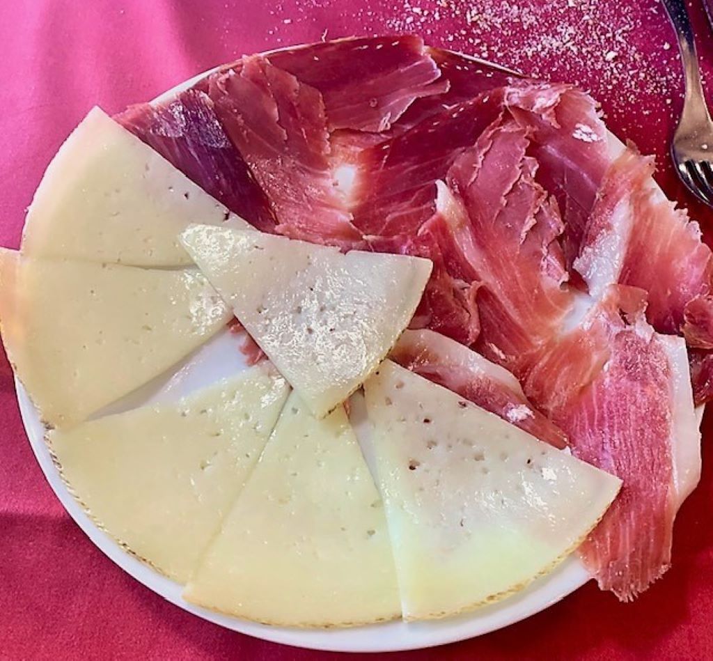 Madrid tapas tour featuring Iberian ham and manchego cheese