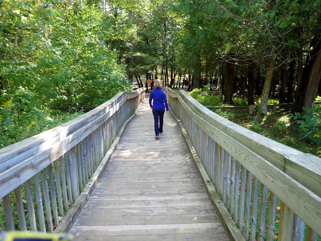 Wooden bridge leading to Kitch-iti-kipi