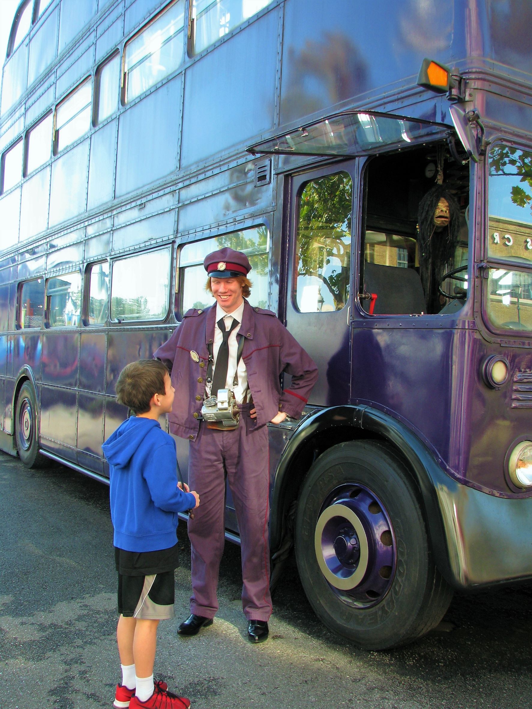 Take time to chat with Knight Bus driver  in the Wizarding World of Harry Potter.
