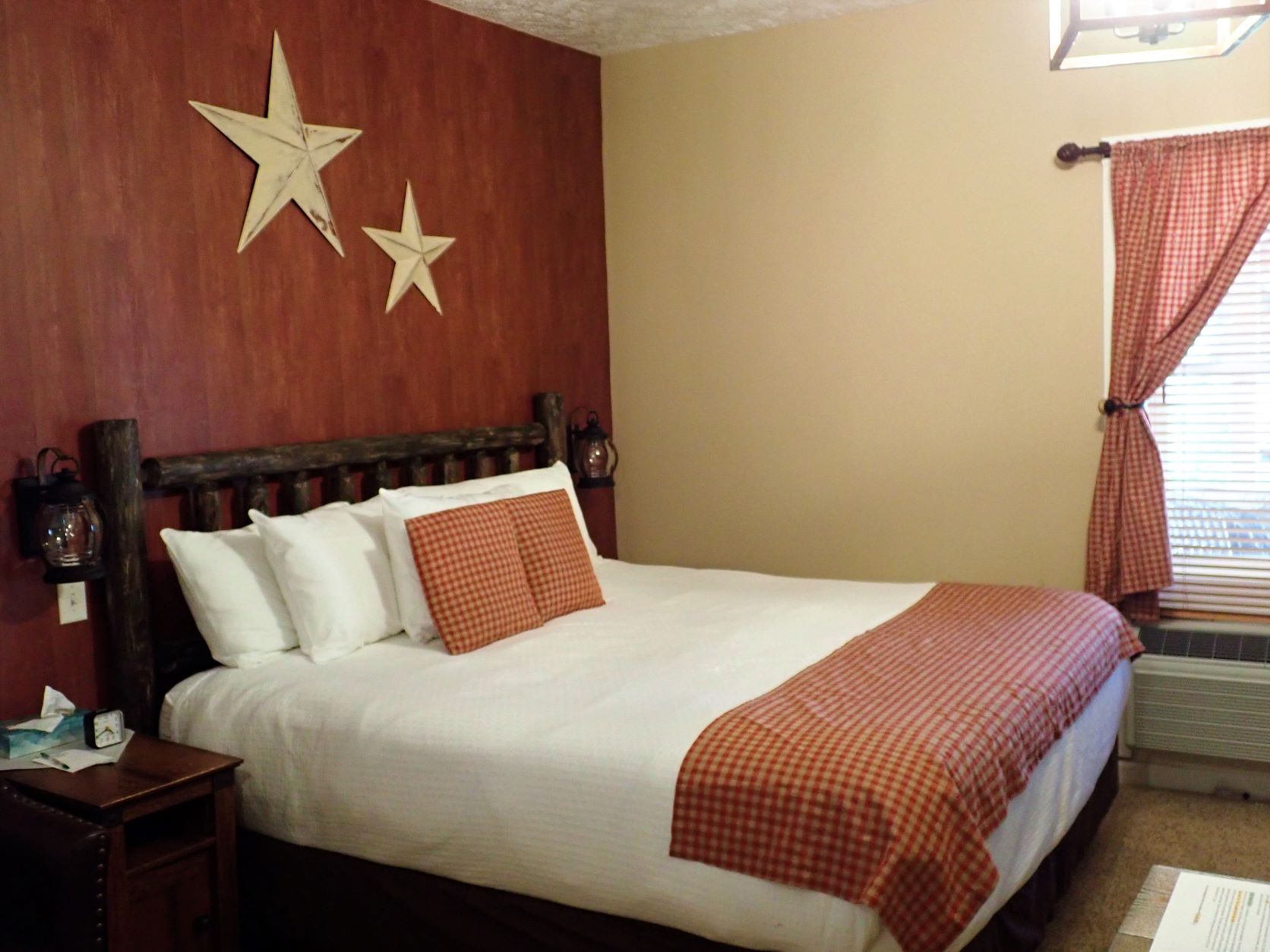 The Barn Room in the Hotel Frankfort boasts a king-sized bed and a jacuzzi tub