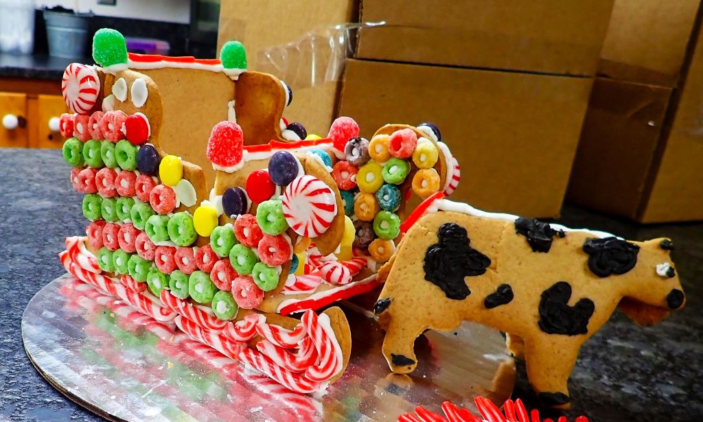 A gingerbread sleigh pulled by a cow at Moomers