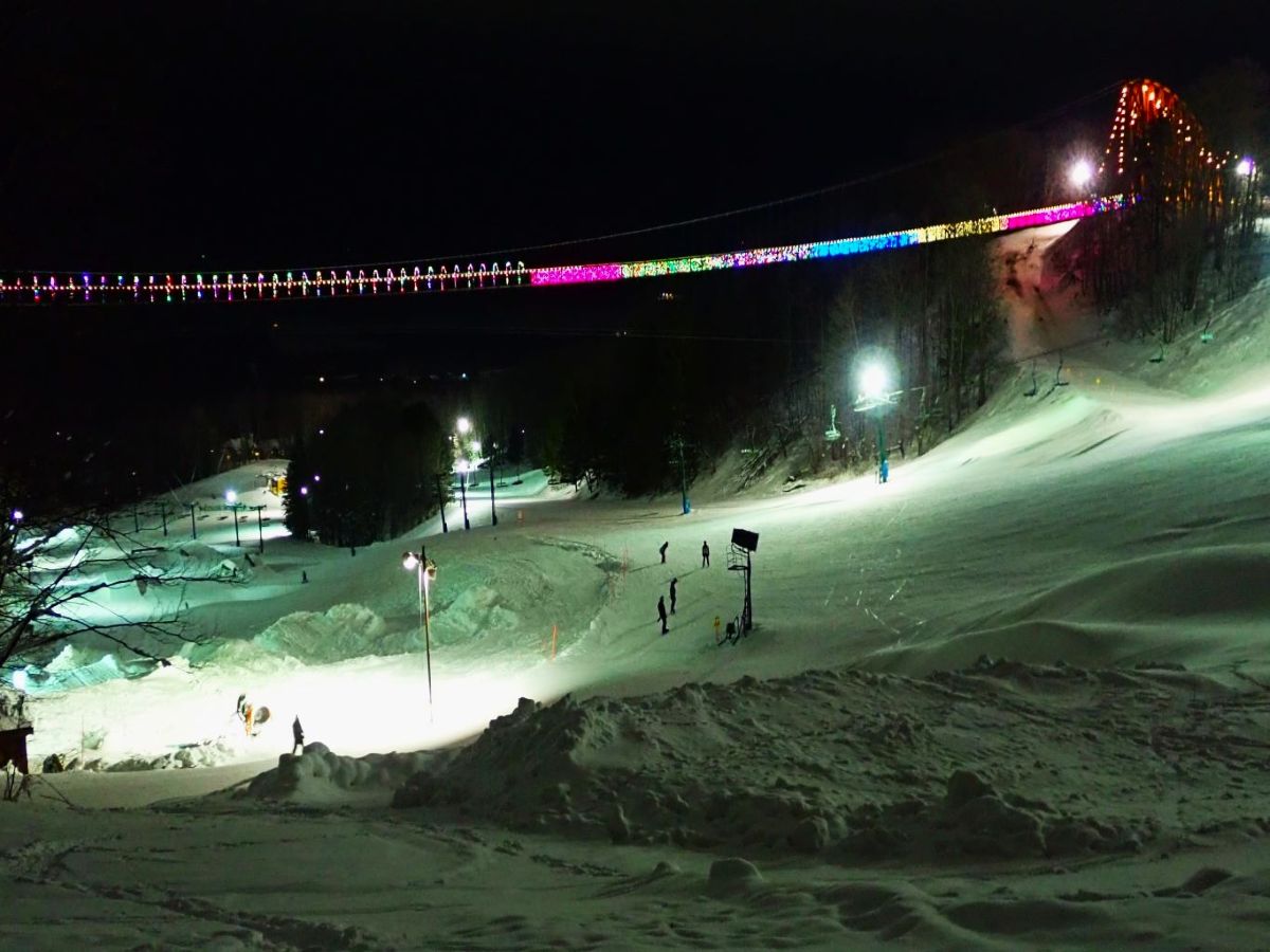 Head out along the loop trail for one of the very best vantage points for taking photos of the illuminated bridge