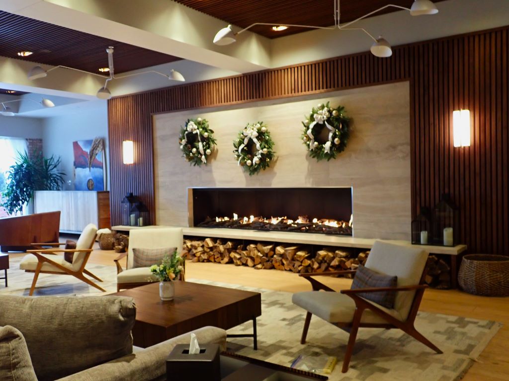 Play a board game by the fireplace inside of the Delamar Hotel