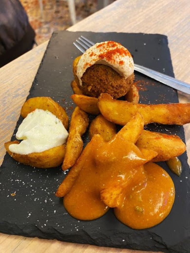 meatballs with potatoes at La Buena Vida Tapas in Granada, Spain