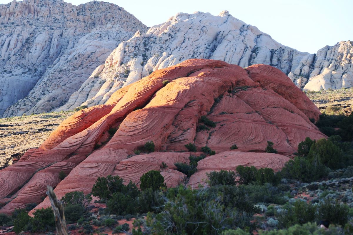 Shadows overtake Snow Canyon State Park as the sun begins to set