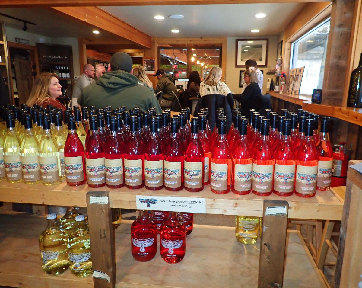 Bottles of wine on display in Chateau Grand Traverse's tasting room.