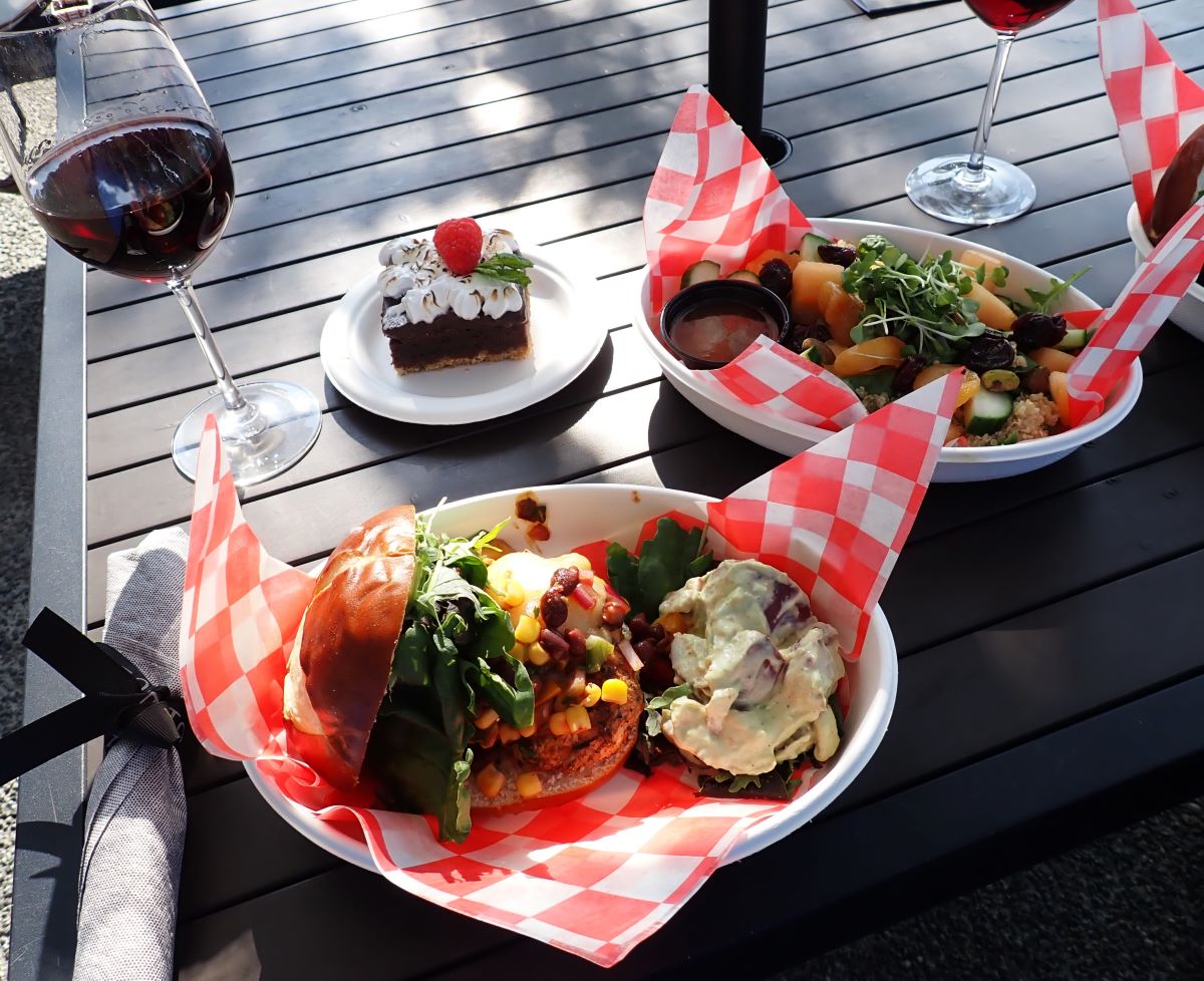 Enjoying foodie Friday at Bluestone Vineyards: Southwest Chicken sandwich with black bean and corn salsa, avocado potato salad, summer salad with dried apricots and a s'more brownie. 