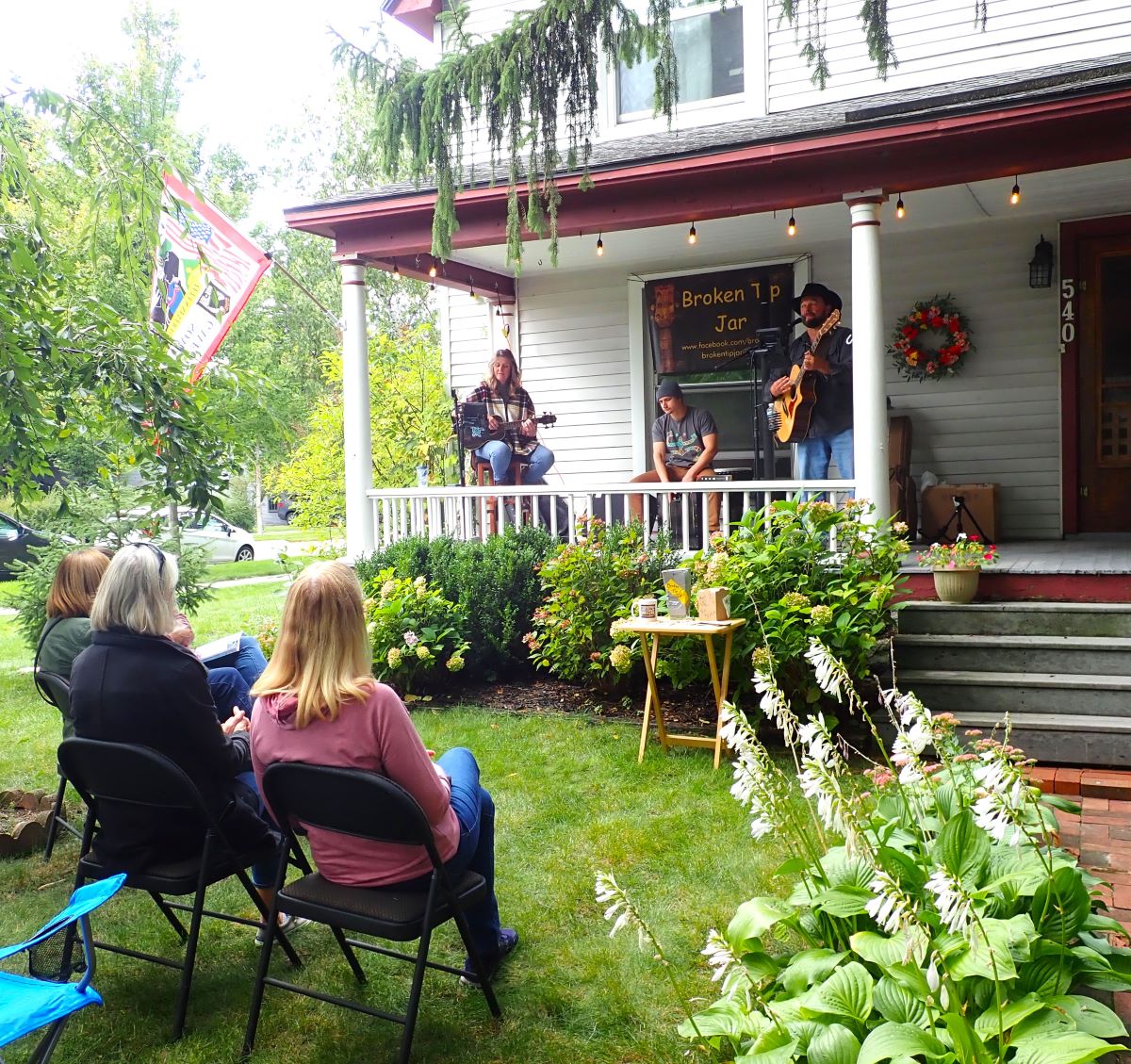 One of my favorite fall events in Traverse City is Porchfest.  Here, the band Broken Tip Jar performs on the porch of a home on Sixth Street.