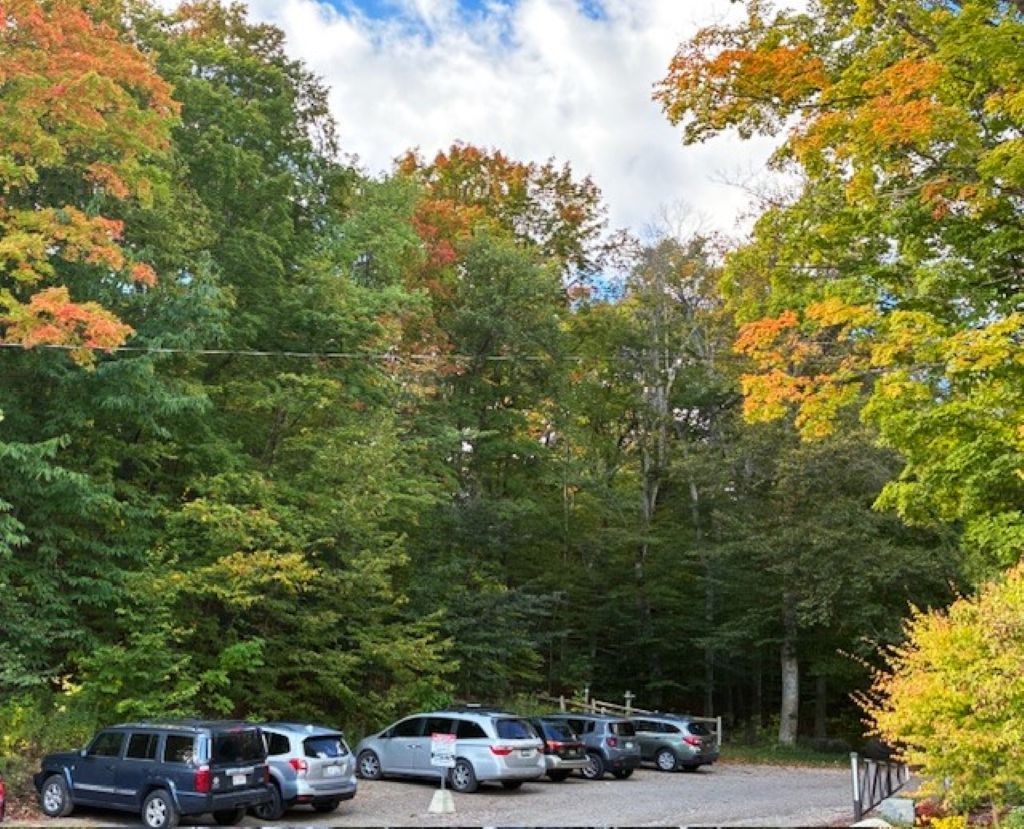 The parking lot for hiking and biking trails at the Grand Traverse Commons Natural Area