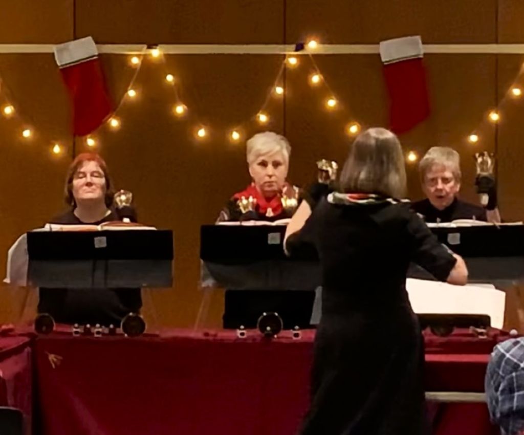 The TLC Handbell Choir performs at the Traverse Area District Library's Woodmere Branch