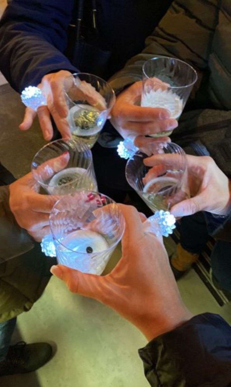 Complimentary champagne and sparkling LED rings are available during Traverse city's Ladies Night shopping event.