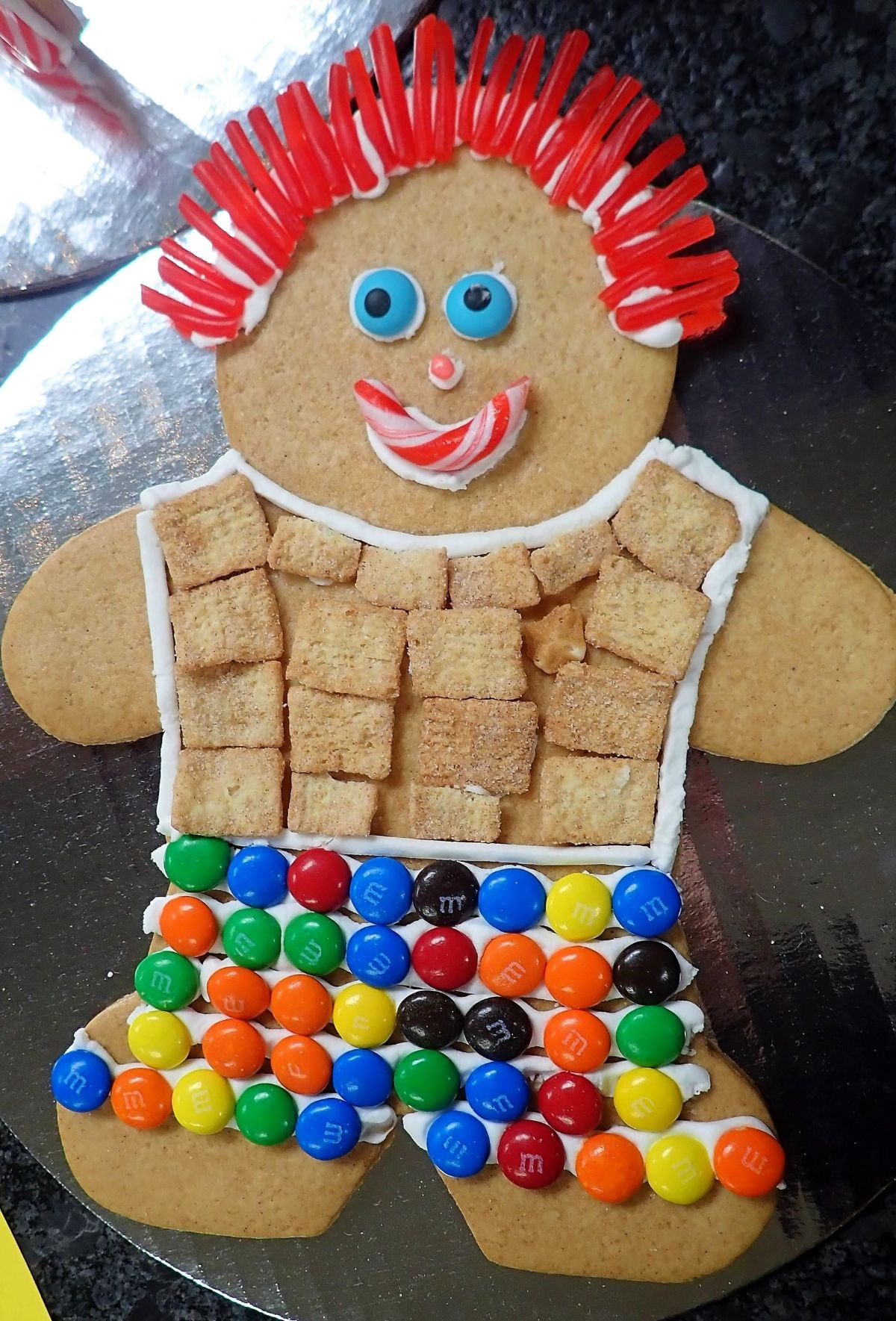 Decorate a gingerbread boy at Moomer's Ice Cream in December