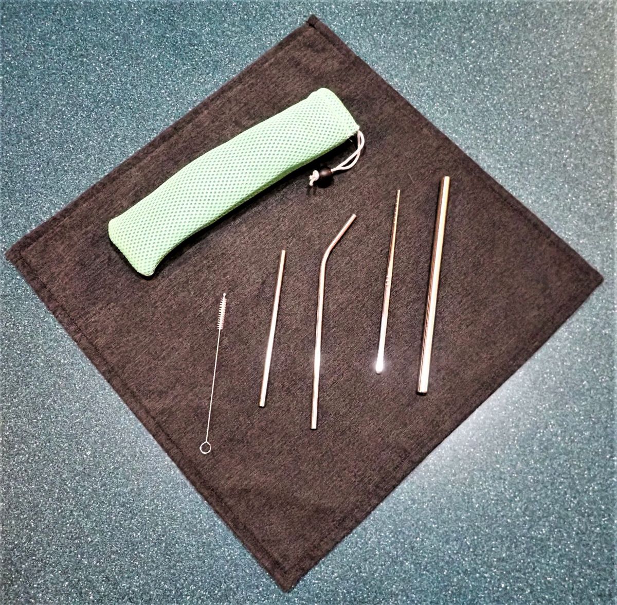 Reusable straws are a thoughtful stocking stuffer for any traveler looking to reduce single-use plastic.