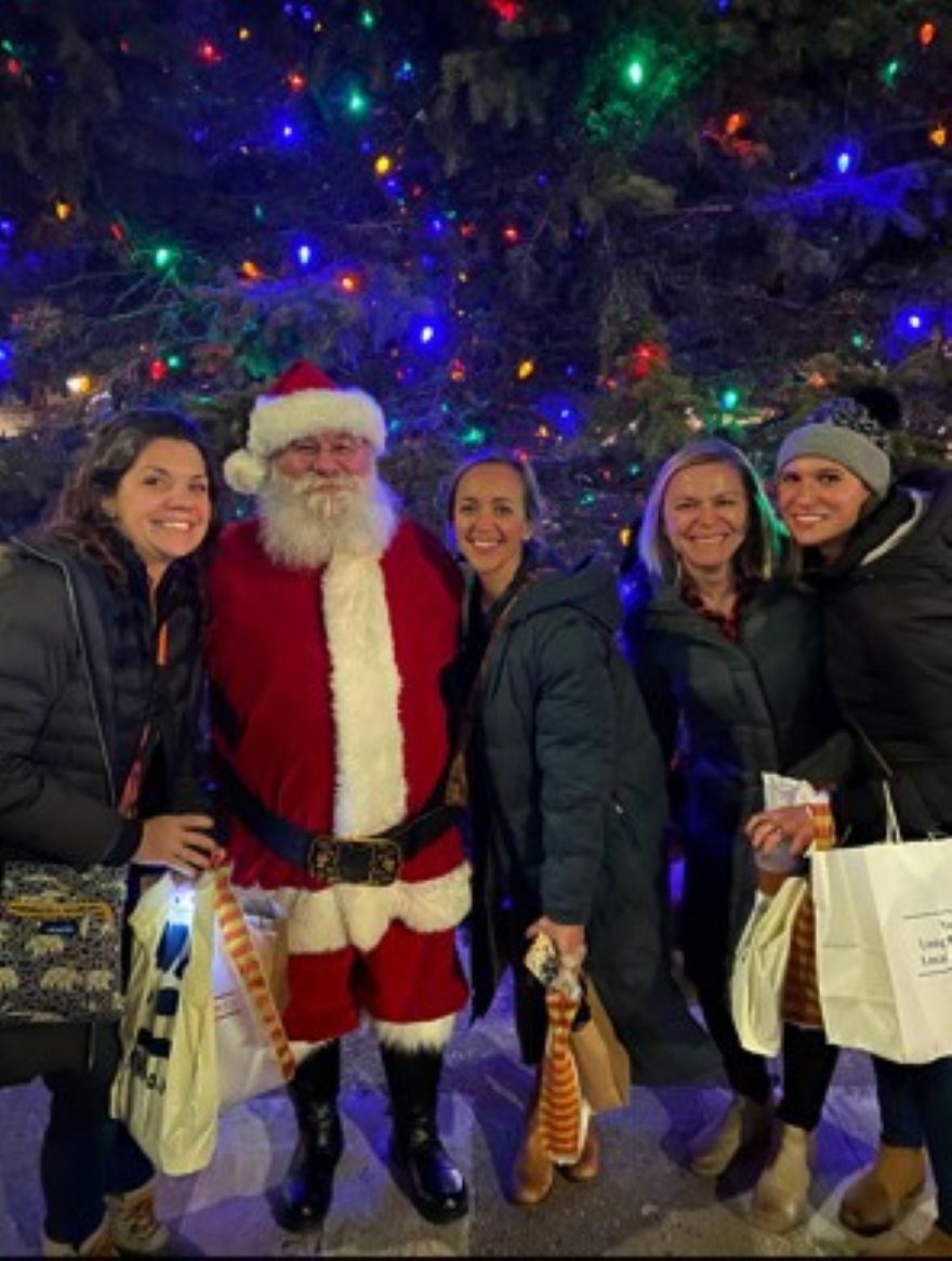 Celebrate Santa's arrival by taking a photo with friends in front of Traverse City's downtown Christmas Tree