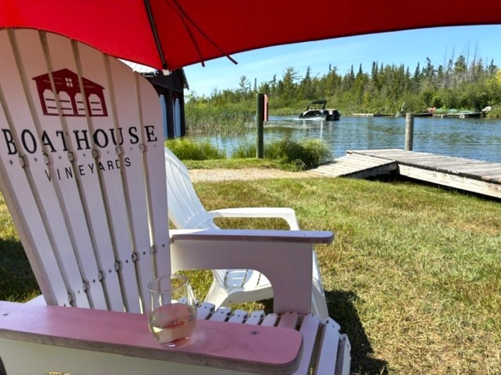 There's nothing better than an unwinding on an Adirondack chair under an umbrella and watching the boats cruise by at Boathouse Vineyards.