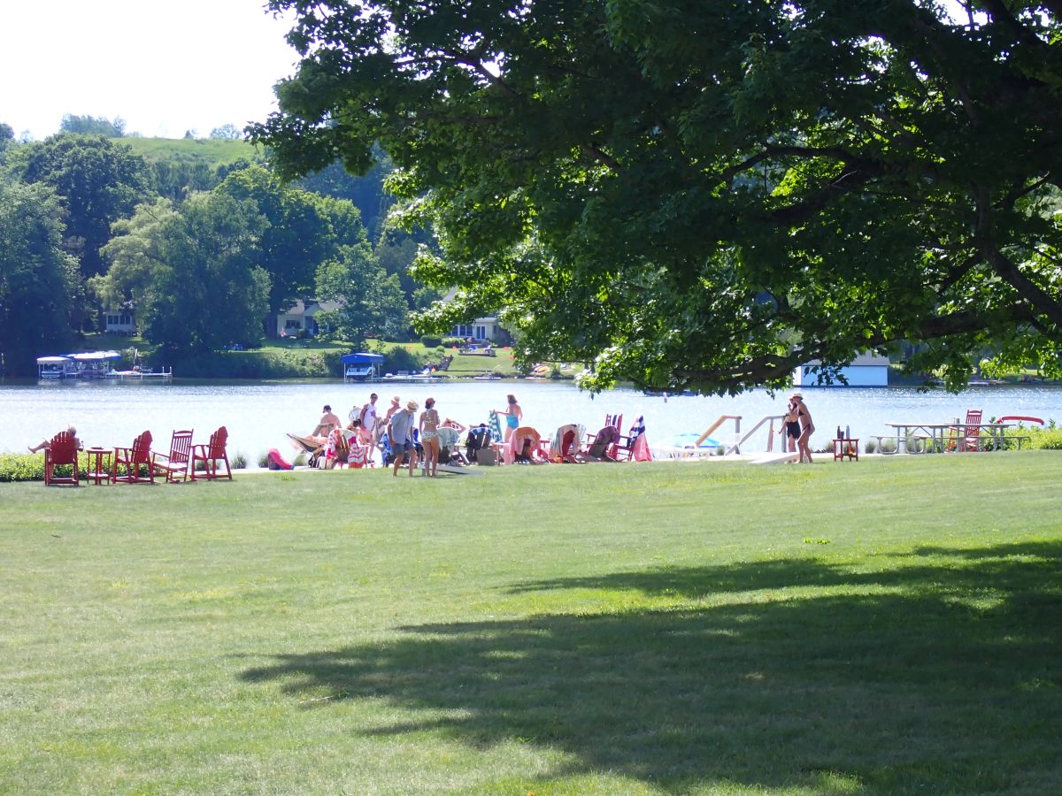 Visitors enjoying the lake at Fountain Point Resort in Lake Leelanau.